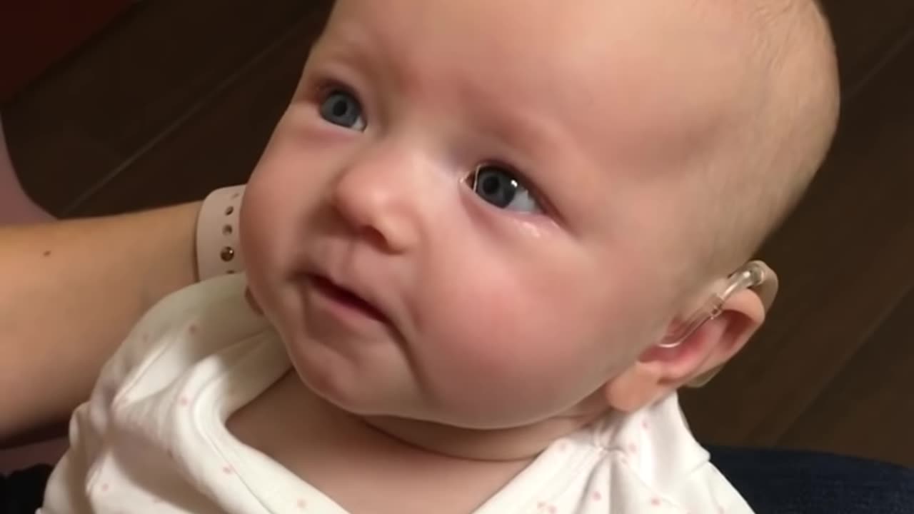 My baby hears me for the first time and is almost moved to tears!