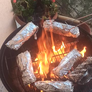Grilling fish on the balcony