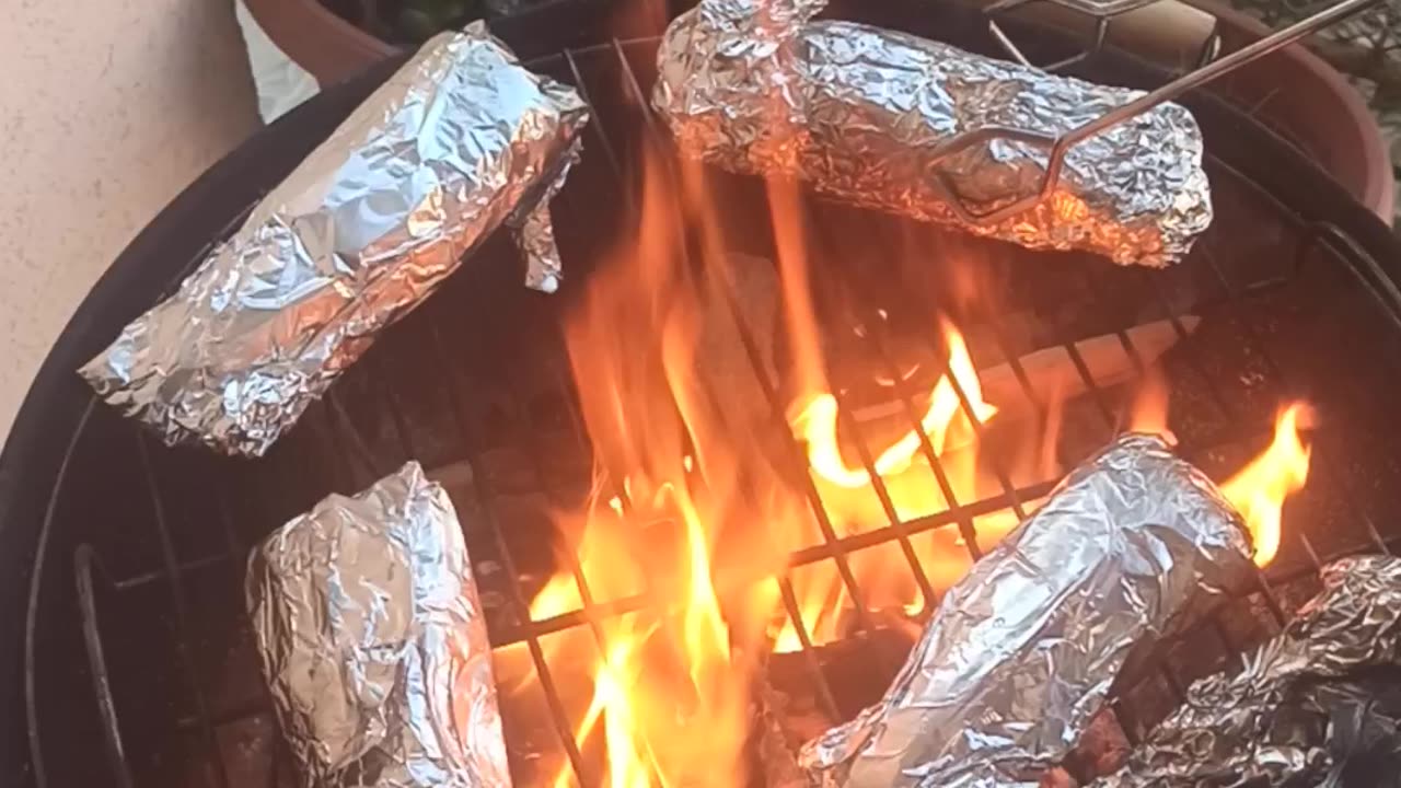Grilling fish on the balcony