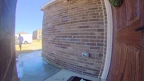 FedEx Delivery Guy Slides Across Ice Delivering Package in Style