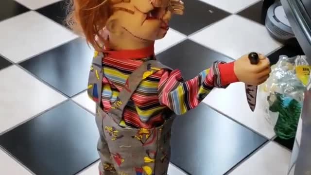 Scary Chucky Doll Rides Around On A Robot Vacuum