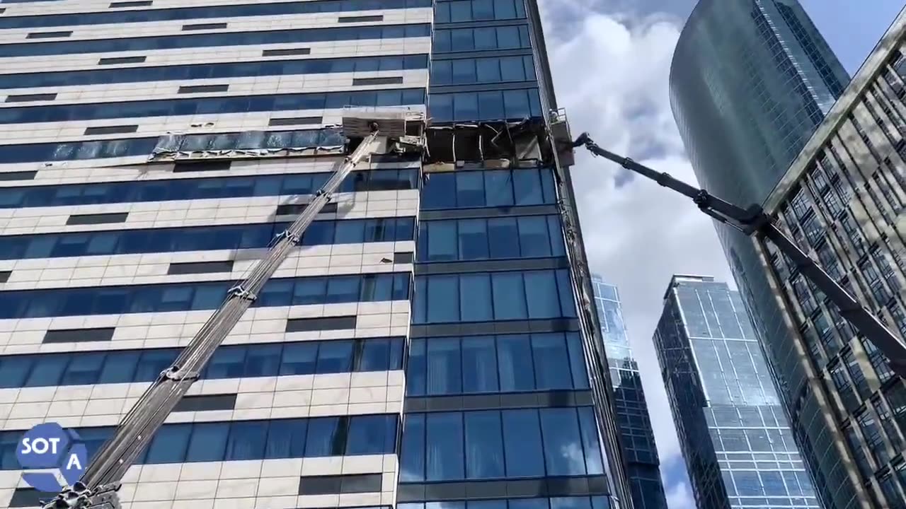 Cleanup and repairs begin on building damaged by drone attack in Moscow