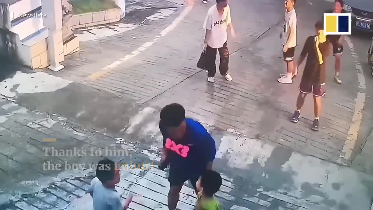 Selfless teenager in China saves boy speeding down slope