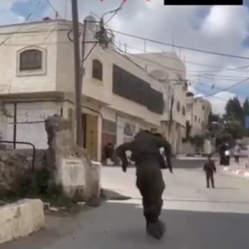 It's Difficult to Watch this Israeli Soldier and Palestinian Kid Play Football Knowing We're At War