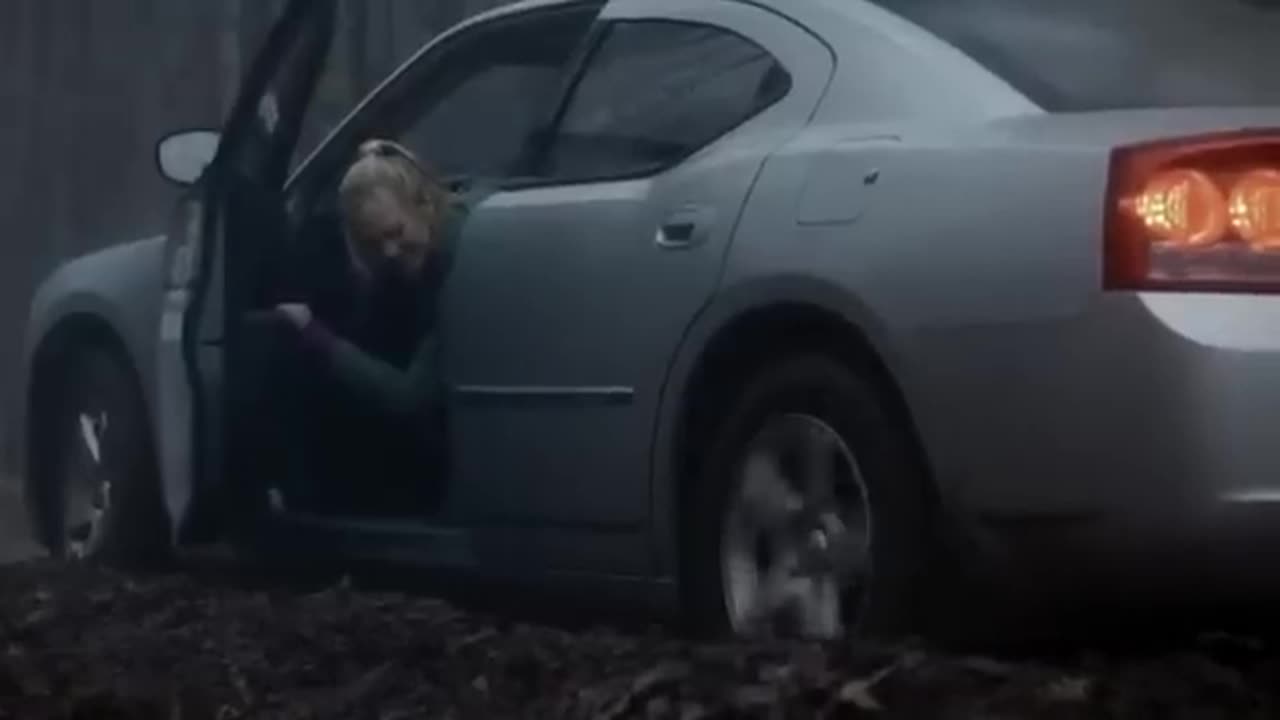 Girl driving dodge and stuck in the mud