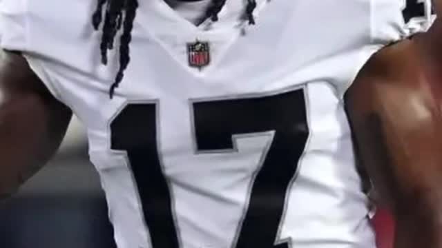Davante Adam's charged with assault after shoving photographer
