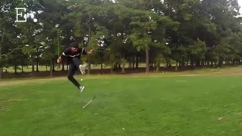 A man tried to hit a balloon with a golf ball