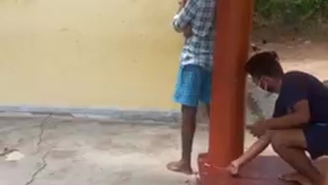Guy Pranks Friend by Bursting Firecracker Behind Him