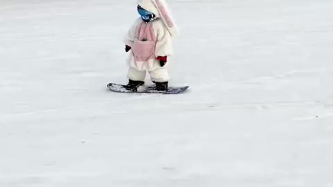 Adorable Kid Enjoying a Fun Ski Adventure"