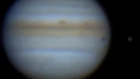 How does jupiter protect Earth from comets and asteroids!