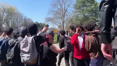 High School Students Cheer After Peer Rips Trans Flag from Lone Protester