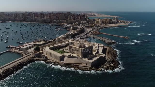 Aerial Drone Shot over Egypt Alexandria City sea - The Citadel of Qaitbay