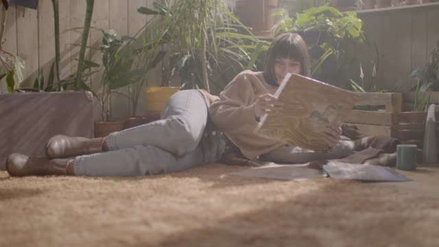 A woman looking at pictures