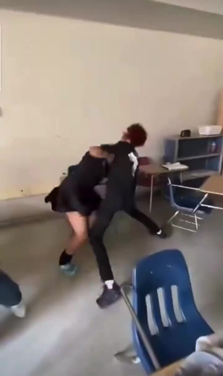two girls start fighting ina classroom cs the girl ina black skirt was ...