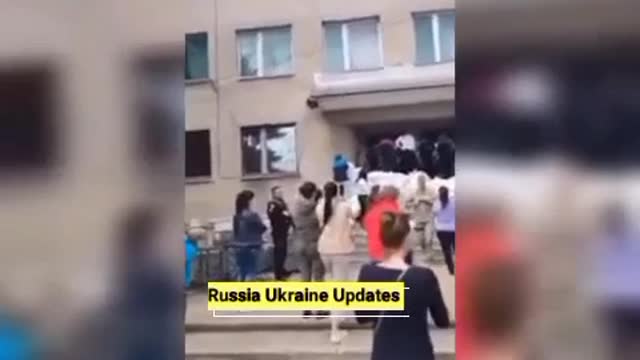 Local wives staged a rally in front of the military registration and enlistment office