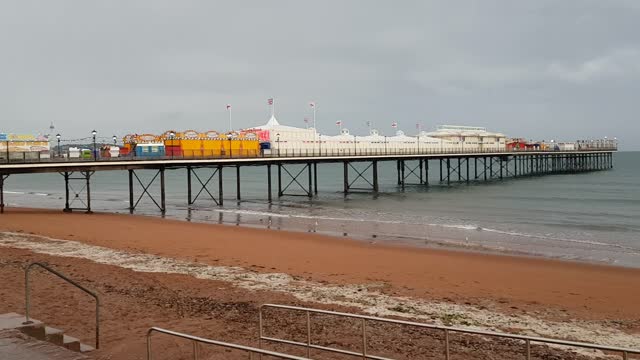 Paignton pier . Nice fish and chips in the car . Lovely view to eat in the car. Even in the rain