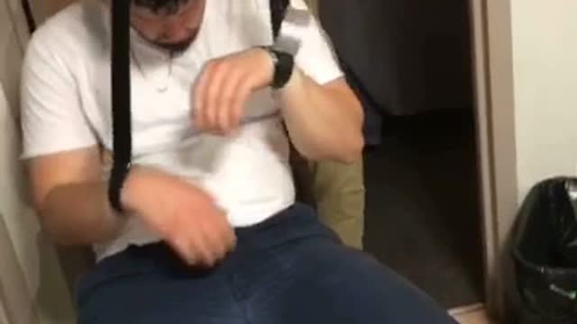 Drunk puppet passed out guy with belts on wrists 1