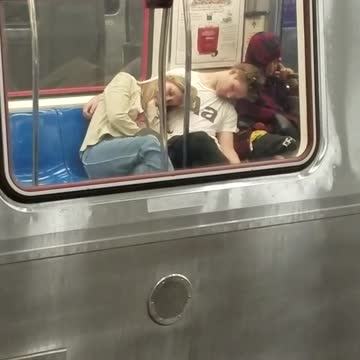Two girls passed out on man on subway