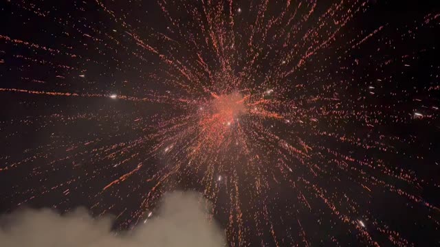 Firework Detonates On It's Way Down