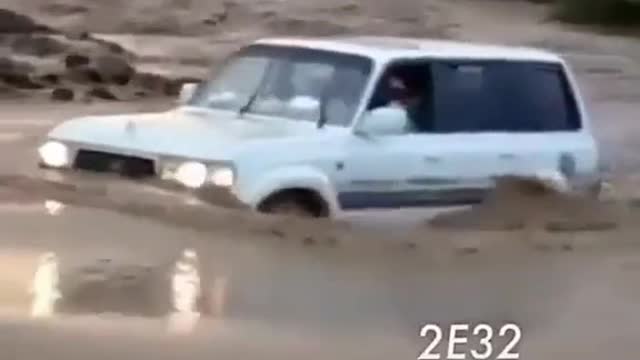 Land Cruiser entry in dry water