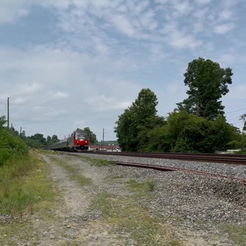 Amtrak #161 passes CSX M409 w/UP Trio!