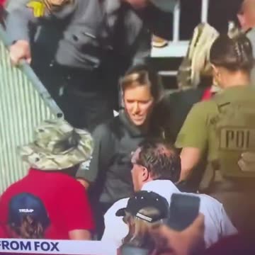 Video footage of an individual being dragged out from Trump's rally in PA After shooting