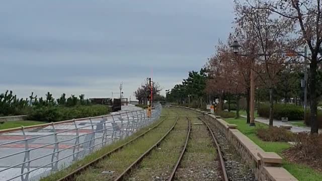 Train road by the sea