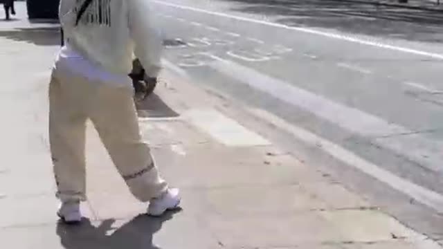 A clueless pranks pedestrians with very funny threats. Check out!