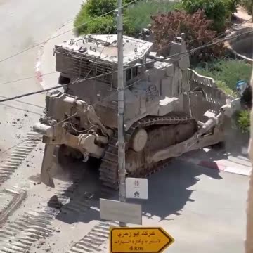 Israel bulldozers a house in he West Bank city of Tulkarem