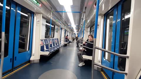 Guy Rides Bicycle in Metro Train