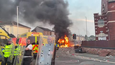 Police protect Southport mosque during riot