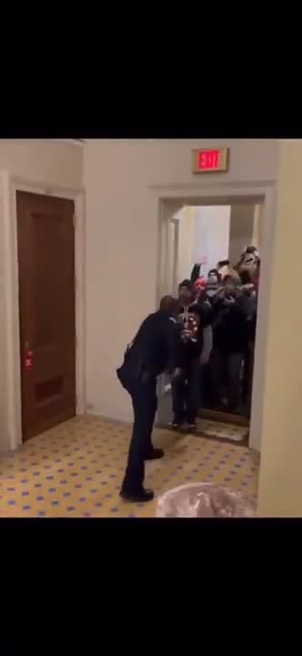 Bad Actor Cop Allows Breach at Capitol Building
