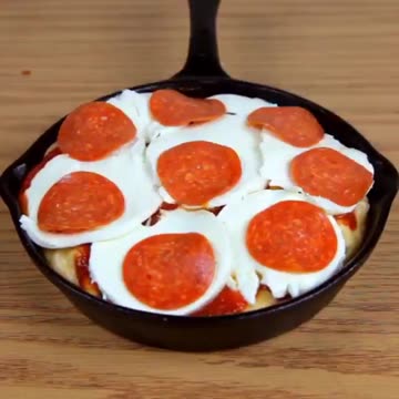 Soup topped with mozzarella sauce