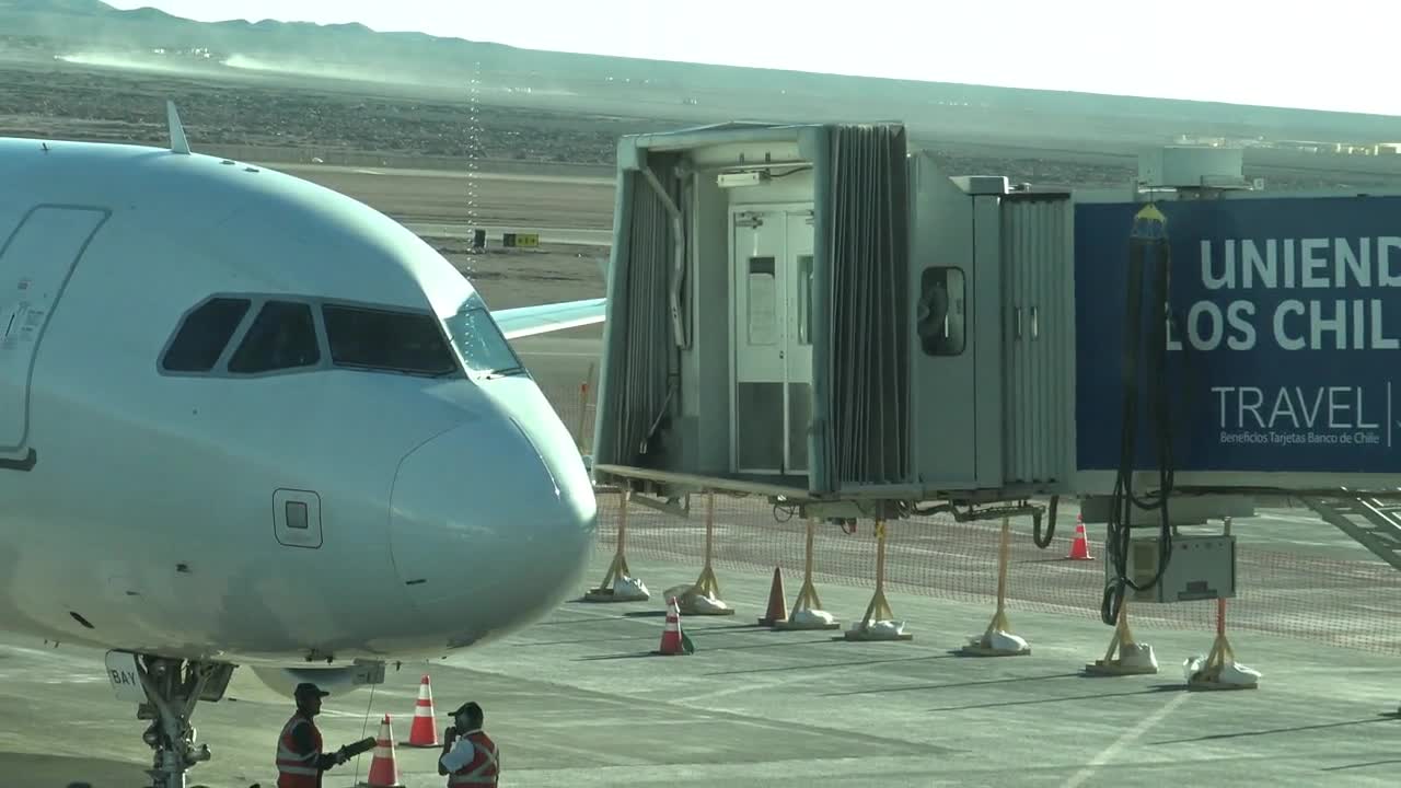 Airplane ground crew preparing the next flight