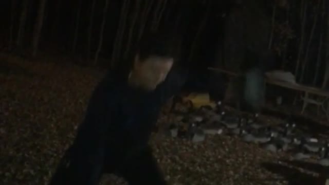 Guy shakes beer and takes off hat before smashing it on head and drinking it