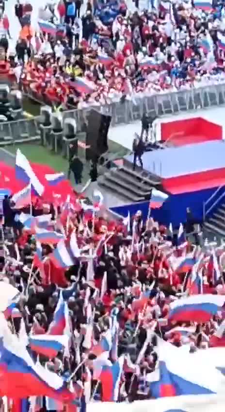HAPPENING NOW-Putin appears at Moscow stadium, praises troops in Ukraine.