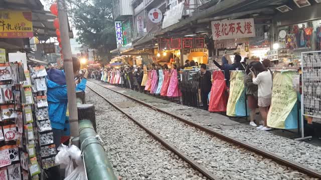 Video of a train entering an alleyway