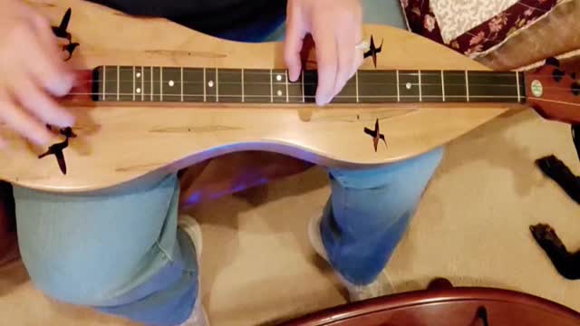 Happy Xmas (War is Over), a John Lennon/Yoko Ono song played on the dulcimer