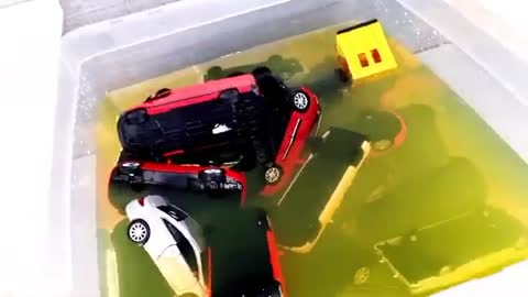 various cars moving and falling into the water - model cars