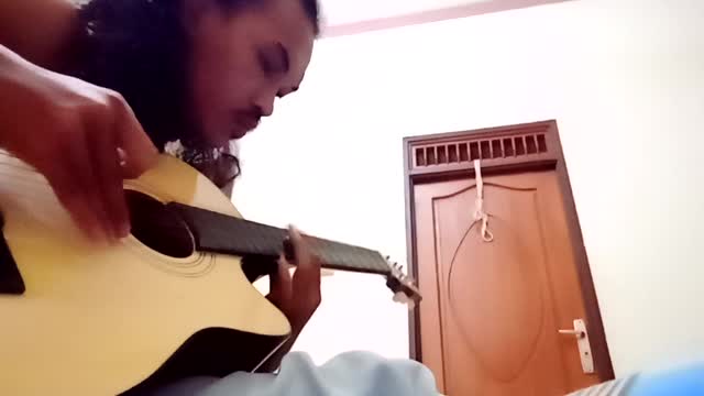 Amazing Song Cover Playing with guitar Kapok