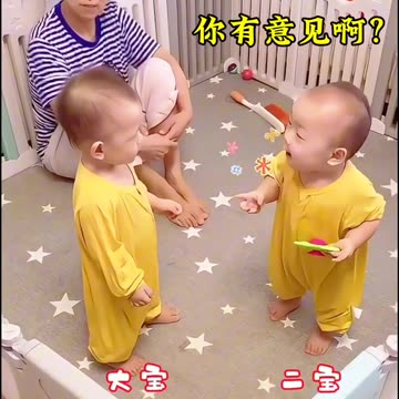 Cute twins having a nice conversation.