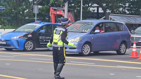 Dancing Traffic Policeman in Singapore