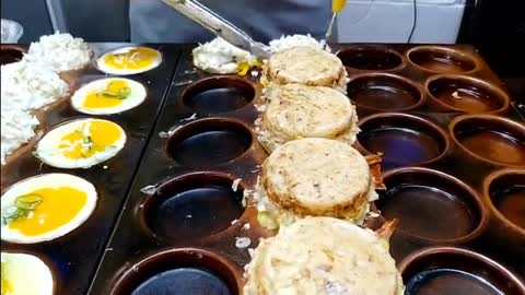 Bacon, shrimp, octopus, a mix of takoyaki and osakiyaki/street food