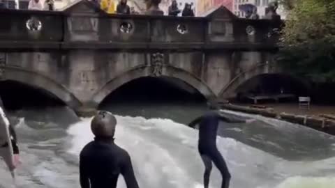 Practicing your pump on a river wave in Germany>>>