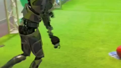Robot vs Human football match! 🤖⚽ The robot scores effortlessly—will we see real robot teams soon?