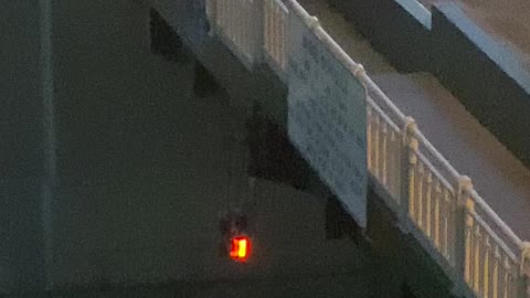 Man in Wheelchair Hangs on While Drawbridge Moves