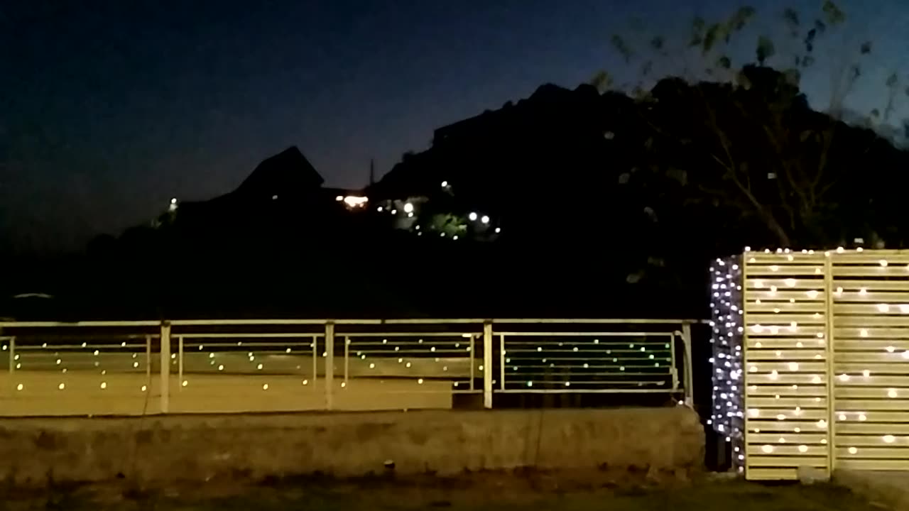 The night view of a hilly city is looking so beautiful and impressive