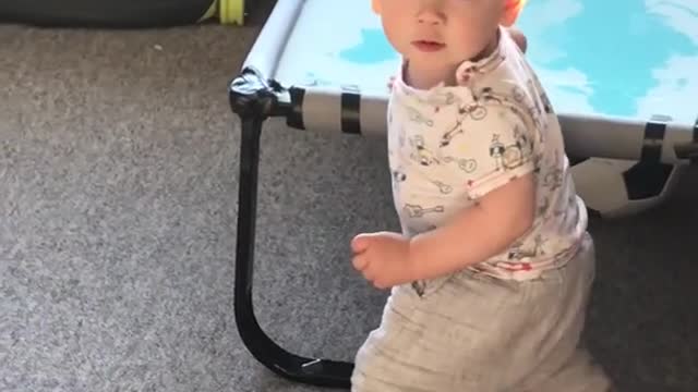 Baby Scares Himself By Touching Toy | baby looking curiously at things!