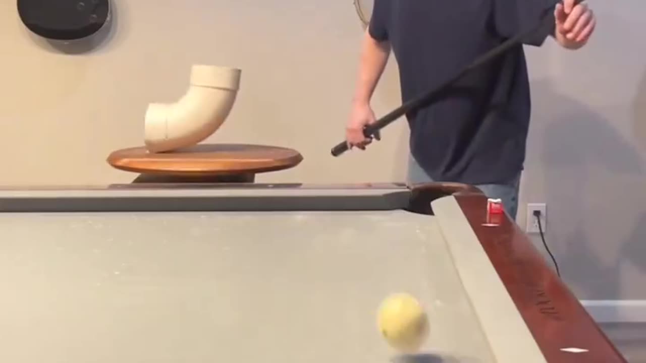 Rotating elbow trick shot