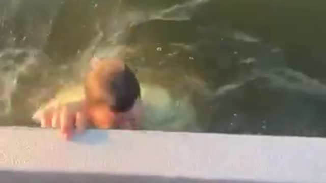 Guy Falls Off Boat While Fishing